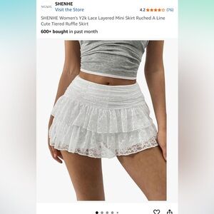 White ruffled mini skirt